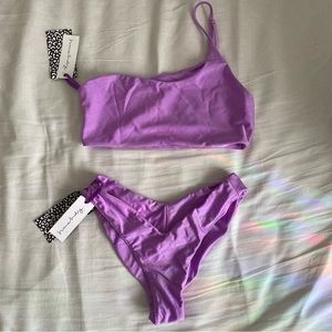 NWT HMEBDY. One Shoulder Purple Bikini Set.